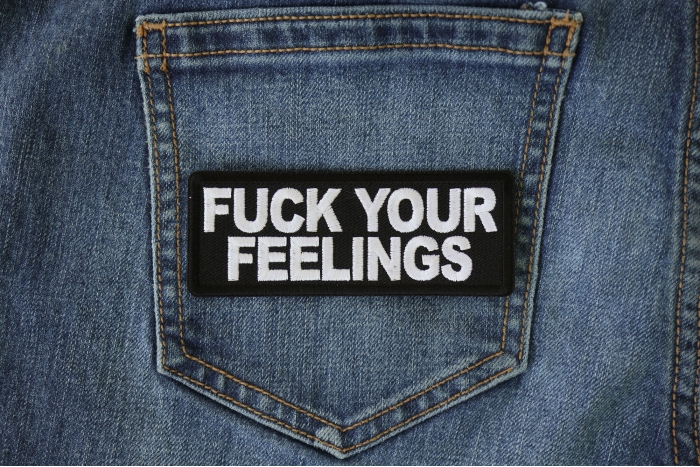 Fuck Your Feelings Patch shown on jeans