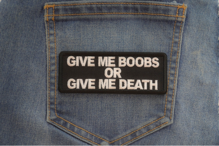 Give me Boobs or Give me Death Patch shown on jeans