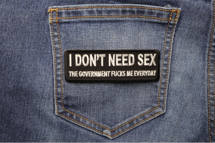 I Don't Need Sex Government Fucks Me Daily Naughty Iron on Patch shown on jeans