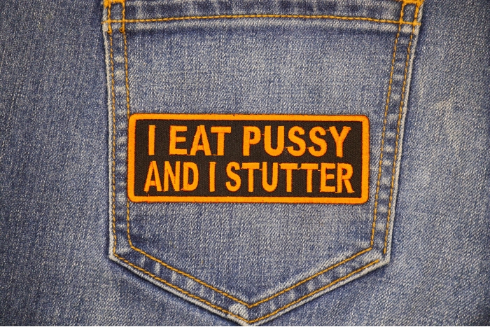 I Eat Pussy and I Stutter Patch shown on jeans