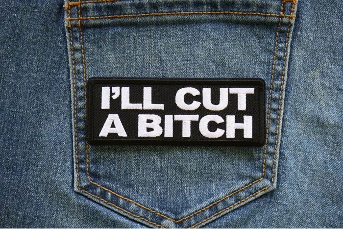 I'll Cut a Bitch Iron on Patch shown on jeans
