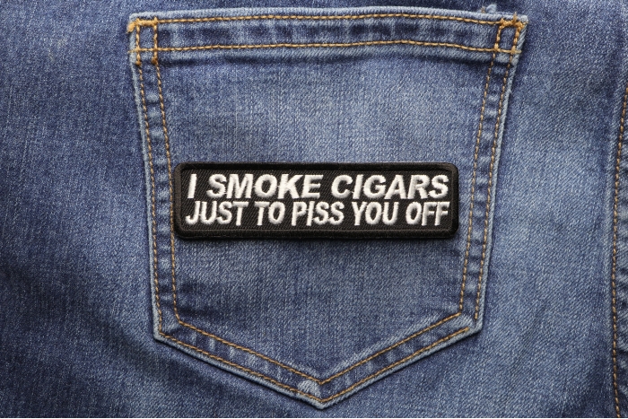 I Smoke Cigars Just To Piss You Off Patch shown on jeans