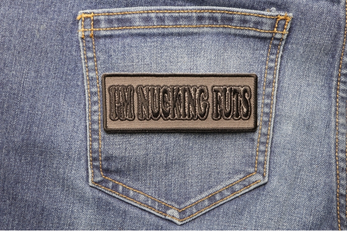 I'm Nucking Futs Patch shown on jeans