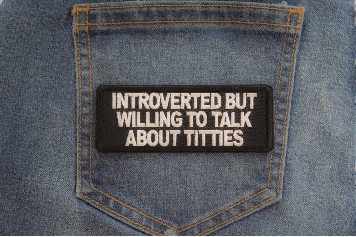 Introverted but willing to talk about titties patch shown on jeans