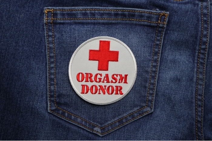 Orgasm Donor Medic Cross Patch shown on jeans