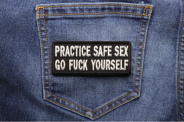Practice Safe Sex Go Fuck Yourself Patch shown on jeans