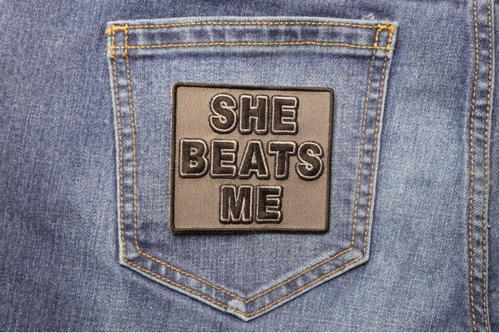 She Beats Me Patch shown on jeans