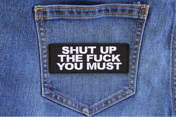 Shut up The Fuck You Must Funny Iron on Patch shown on jeans