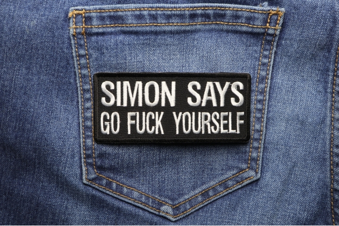 Simon Says Go Fuck Yourself Patch shown on jeans