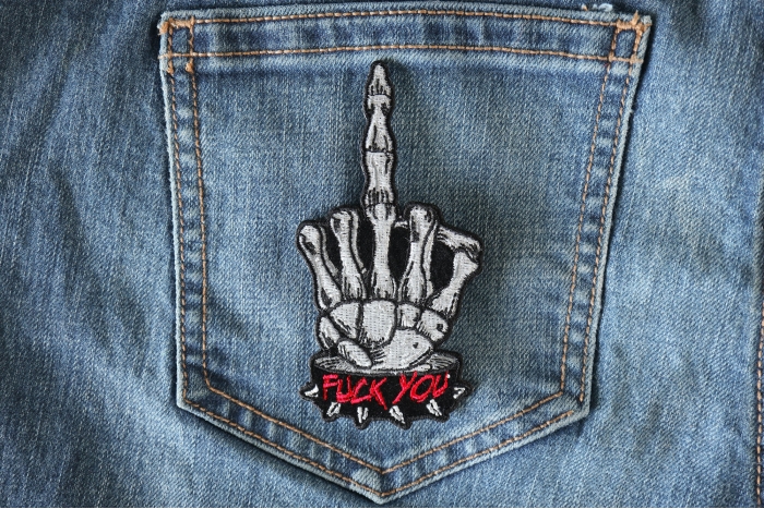Skeleton Fuck You Middle Finger Patch shown on jeans