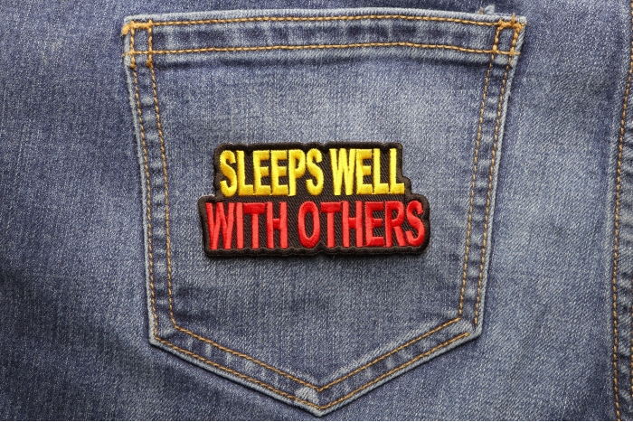 Sleeps Well With Others Patch shown on jeans