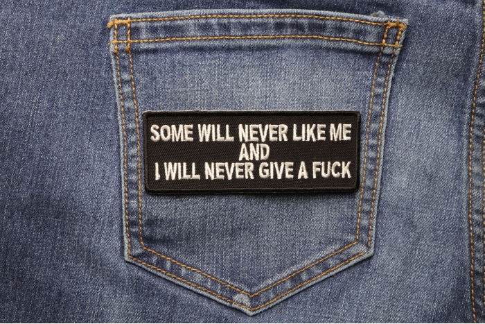 Some Will Never Like and I Will Never Give A Fuck Patch shown on jeans
