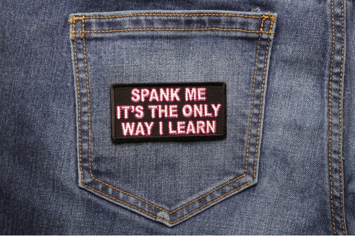 Spank Me The Only Way I Learn Patch shown on jeans
