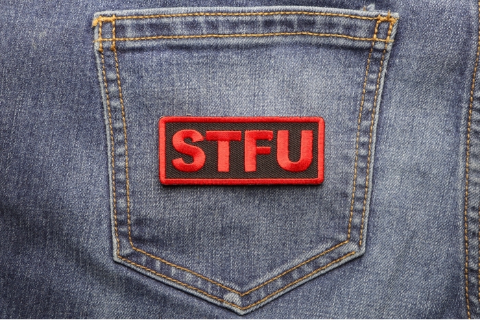 Stfu Patch shown on jeans