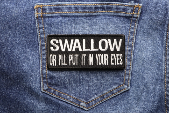 Swallow or I'll Put It In Your Eyes Funny Biker Patch shown on jeans