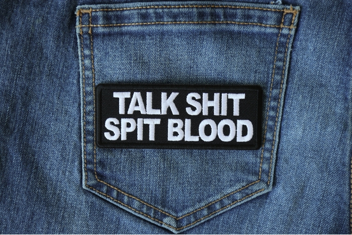 Talk Shit Spit Blood Patch shown on jeans