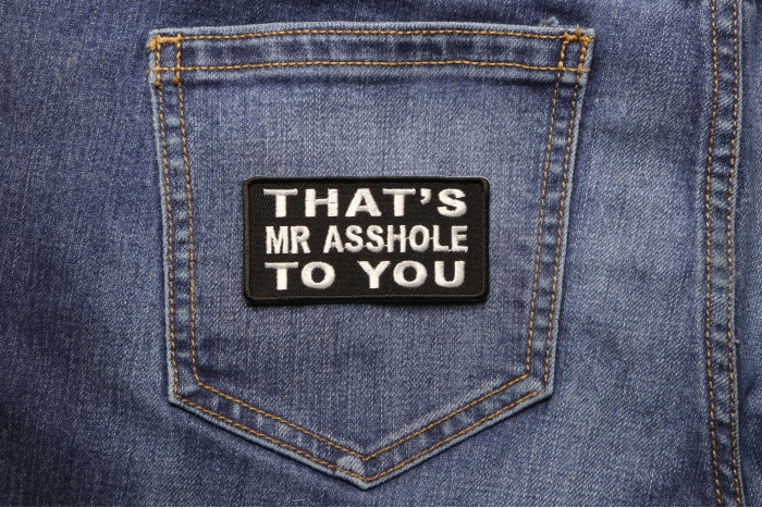 That's Mr Asshole To You Patch shown on jeans