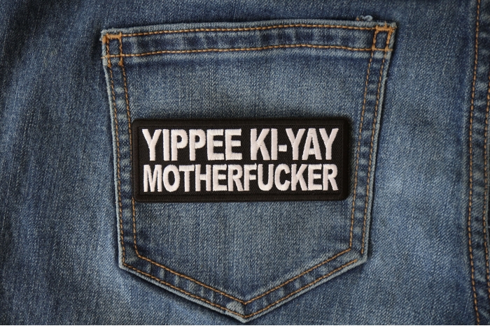 Yippee Ki Yay Motherfucker Patch shown on jeans