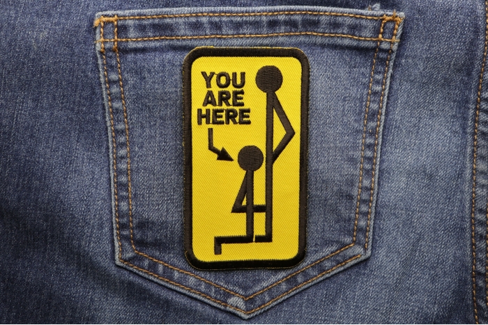 You Are Here Patch shown on jeans