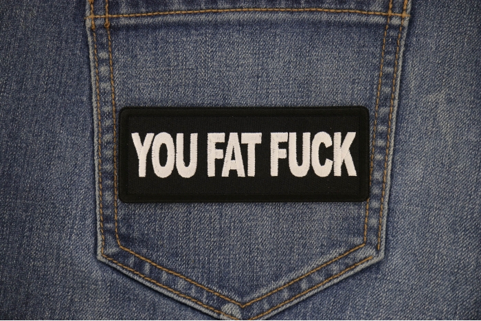 You Fat Fuck Patch shown on jeans