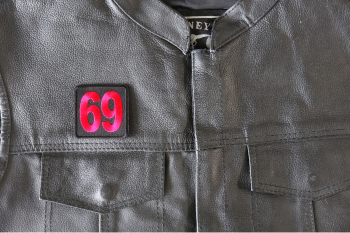 69 Patch, Iron on Patch, Embroidered shown on leather vest