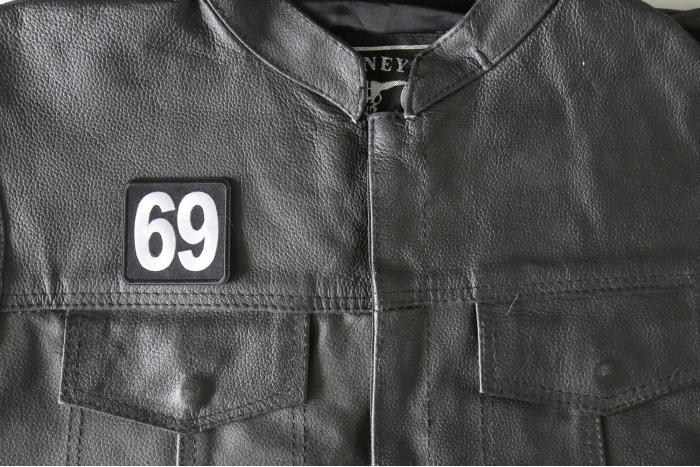 69 Patch, Iron on Patch, Embroidered shown on leather vest
