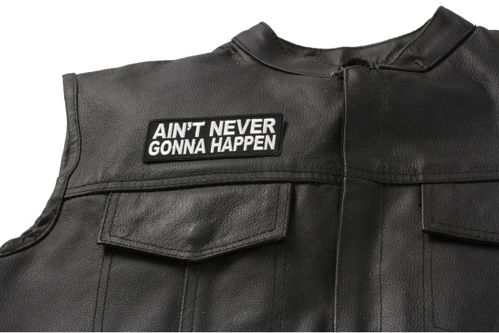 Ain't Never Gonna Happen Patch - Iron on Patch - 4x1.5 inch shown on leather vest