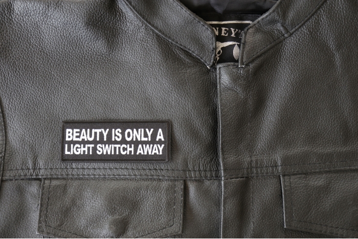 Beauty is Only a Light Switch Away Patch, Funny Saying Patches shown on leather vest