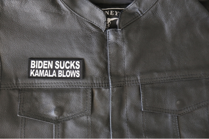 Biden Sucks Kamala Blows Patch - 4x1.5 inch - Embroidered Iron on Patch shown on leather vest