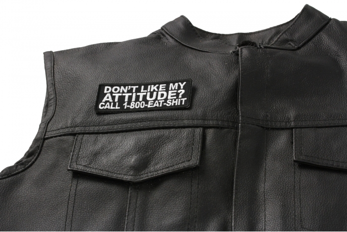 Don't Like My Attitude Call 1 800 Eat Shit Patch - 4x1.5 inch. Embroidered Iron on Patch shown on leather vest