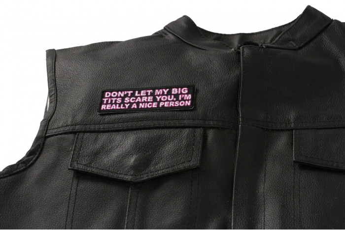 Don't Let My Big Tits Scare You I'm Really A Nice Person Patch, Funny Saying Patches shown on leather vest