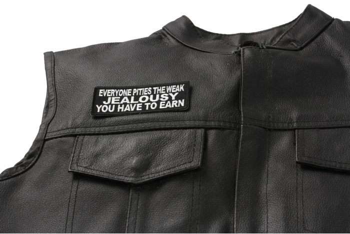 Everyone Pities The Weak Jealousy You Have To Earn Patch - Iron on Patch - 4x1.5 inch shown on leather vest