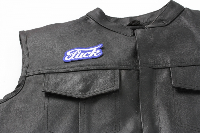 Ford Fuck Biker Patch - 3x1.25 inch. Embroidered Iron on Patch shown on leather vest