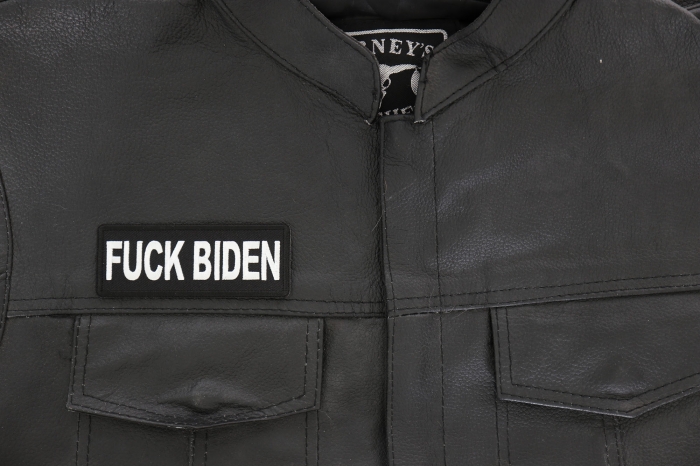 Fuck Biden Patch - 4x1.5 inch - Embroidered Iron on Patch shown on leather vest
