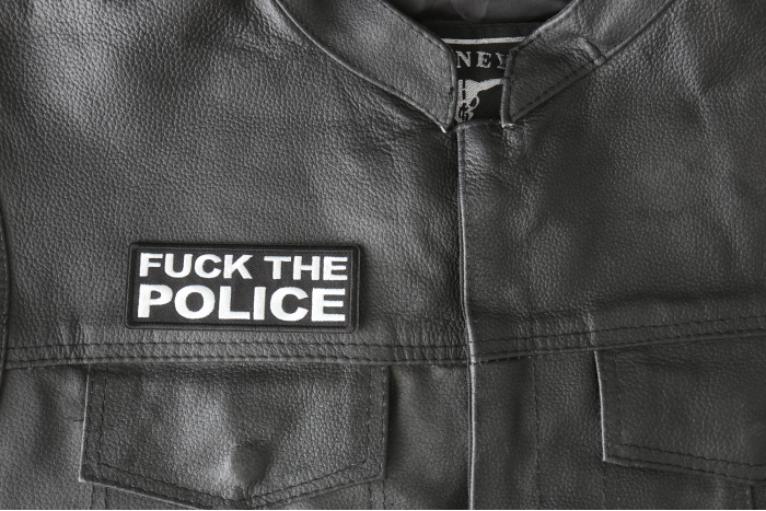 Fuck The Police Patch - 4x1.5 inch - Embroidered Iron on Patch shown on leather vest