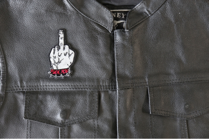 Fuck You Giving the Finger Patch - 2x3.5 inch - Embroidered Iron on Patch shown on leather vest