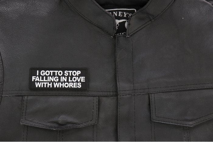 I gotto Stop Falling in Love with Whores Patch, Funny Saying Patches shown on leather vest