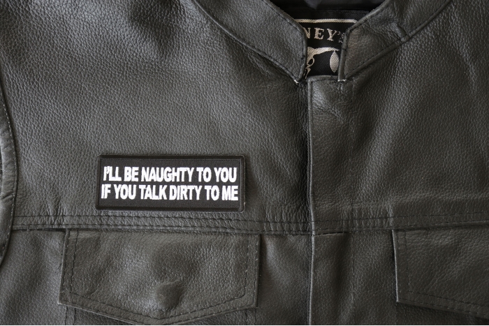 I'll be Naughty to you If You Talk Dirty to Me Patch - 4x1.5 inch - Embroidered Iron on Patch shown on leather vest