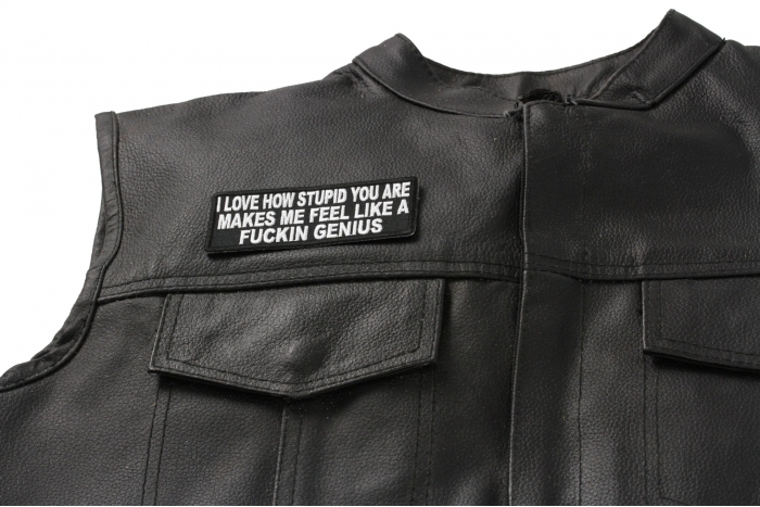 I Love How Stupid You Are Patch - 4x1.5 inch. Embroidered Iron on Patch shown on leather vest