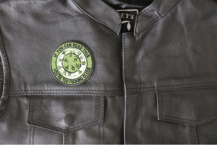 If you Can Read this You are too Fucking Close Patch shown on leather vest