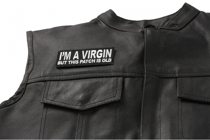 I'm A Virgin But This Patch Is Old - 4x1.5 inch. Embroidered Iron on Patch shown on leather vest
