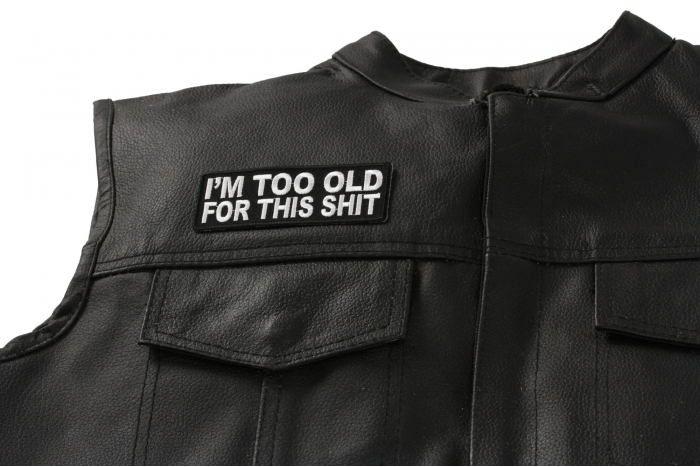 I'm Too Old For This Shit Patch - 4x1.5 inch. Embroidered Iron on Patch shown on leather vest