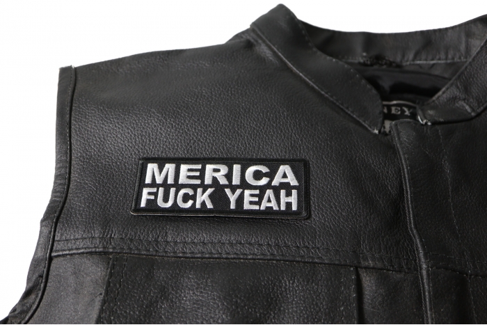 Merica Fuck Yeah Patch - 4x1.5 inch. Embroidered Iron on Patch shown on leather vest