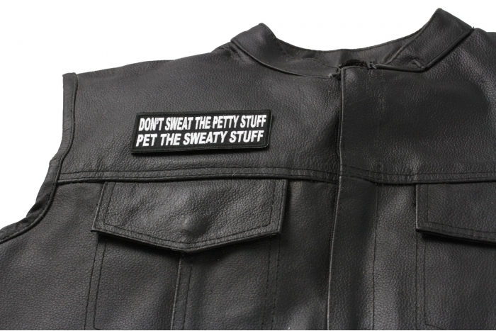 Pet The Sweaty Stuff Patch - 4x1.5 inch. Embroidered Iron on Patch shown on leather vest