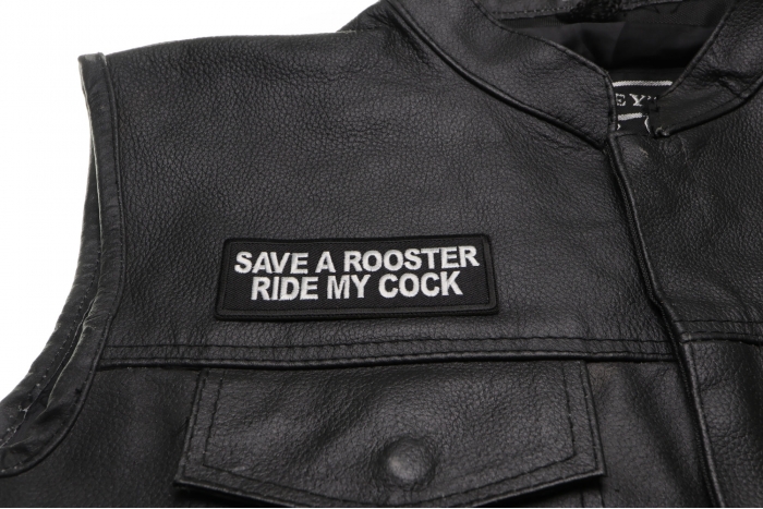 Save a Rooster Ride My Cock Patch - 4x1.5 inch. Embroidered Iron on Patch shown on leather vest