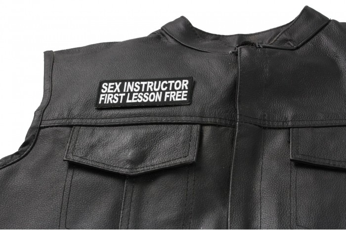 Sex Instructor First Lesson Free Patch, Funny Saying Patches shown on leather vest