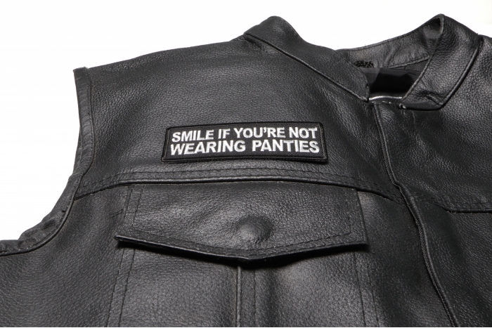 Smile If You're Not Wearing Panties Patch, Funny Saying Patches shown on leather vest