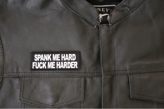 Spank me Hard Fuck me Harder Patch - 4x1.5 inch - Embroidered Iron on Patch shown on leather vest