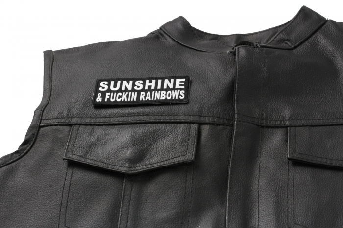 Sunshine and Fuckin Rainbows Patch, Funny Patches for Adults shown on leather vest
