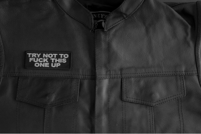 Try Not To Fuck This One Up Patch shown on leather vest